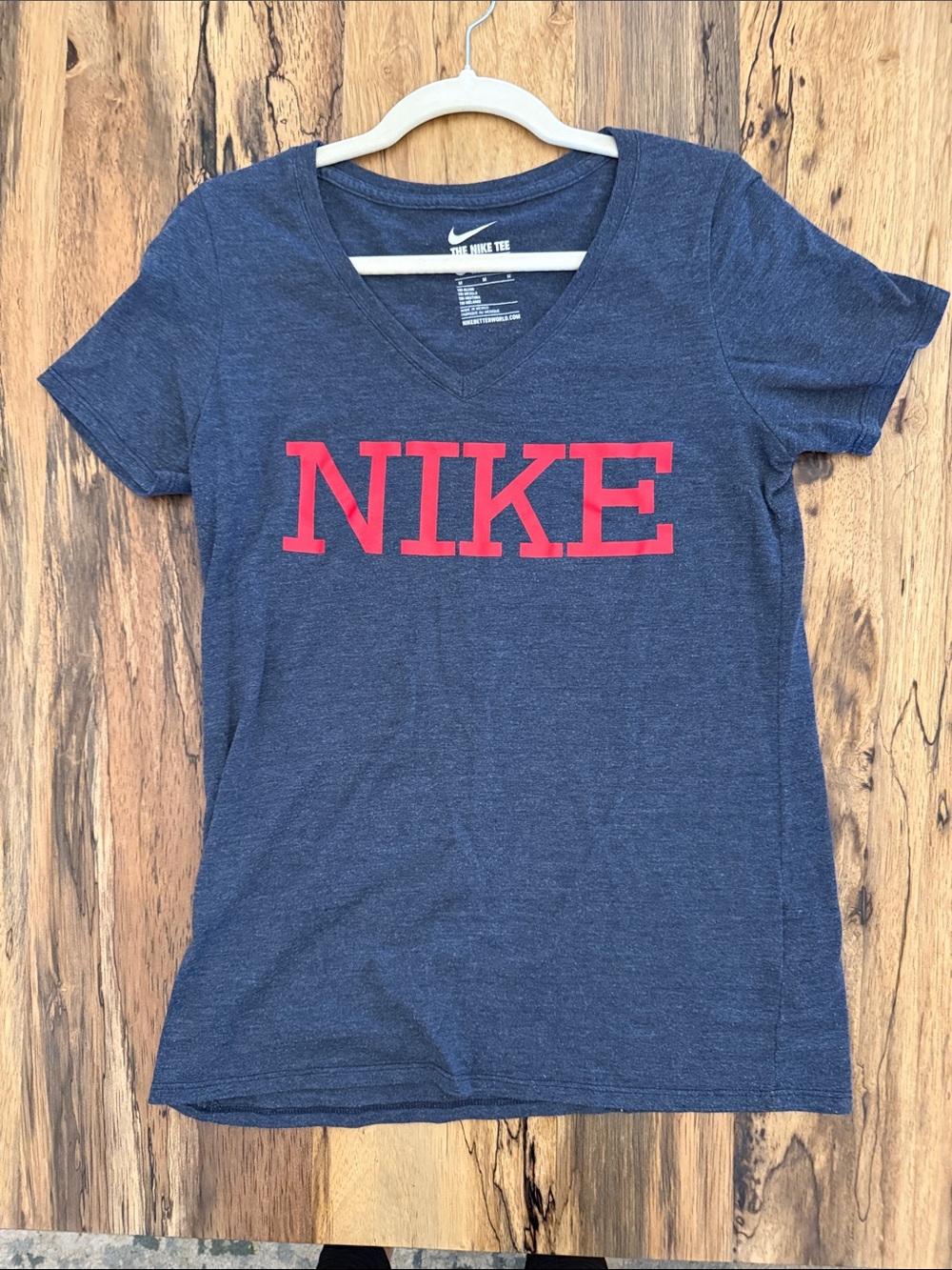 Nike Navy V‑Neck Tee with Red NIKE Chest Logo